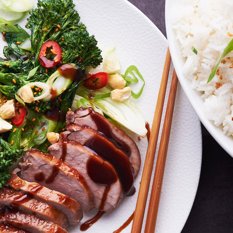 Hoisin Pork Tenderloin with rice, pak choy, and broccolini